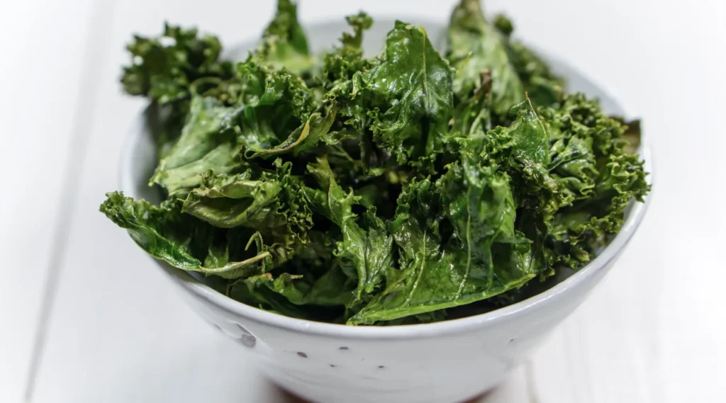 kale chips in a white bowl