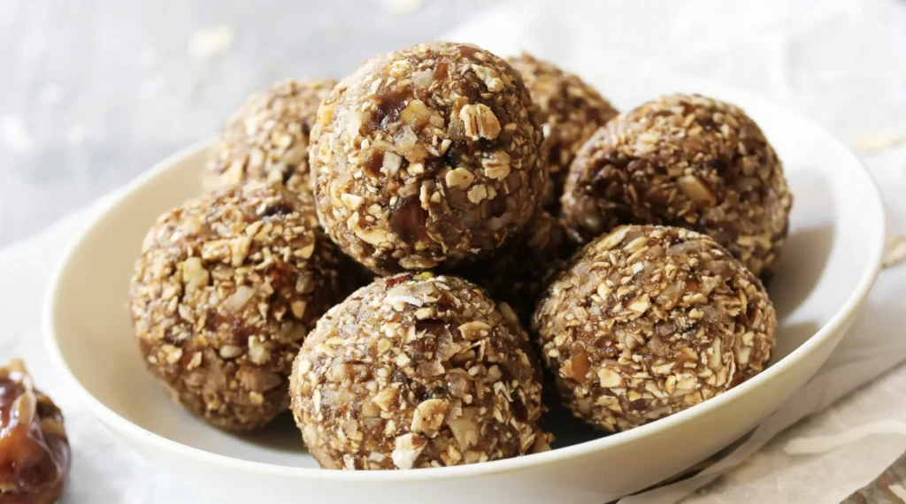 no bake cookies or energy bites, 5 of them in a white bowl