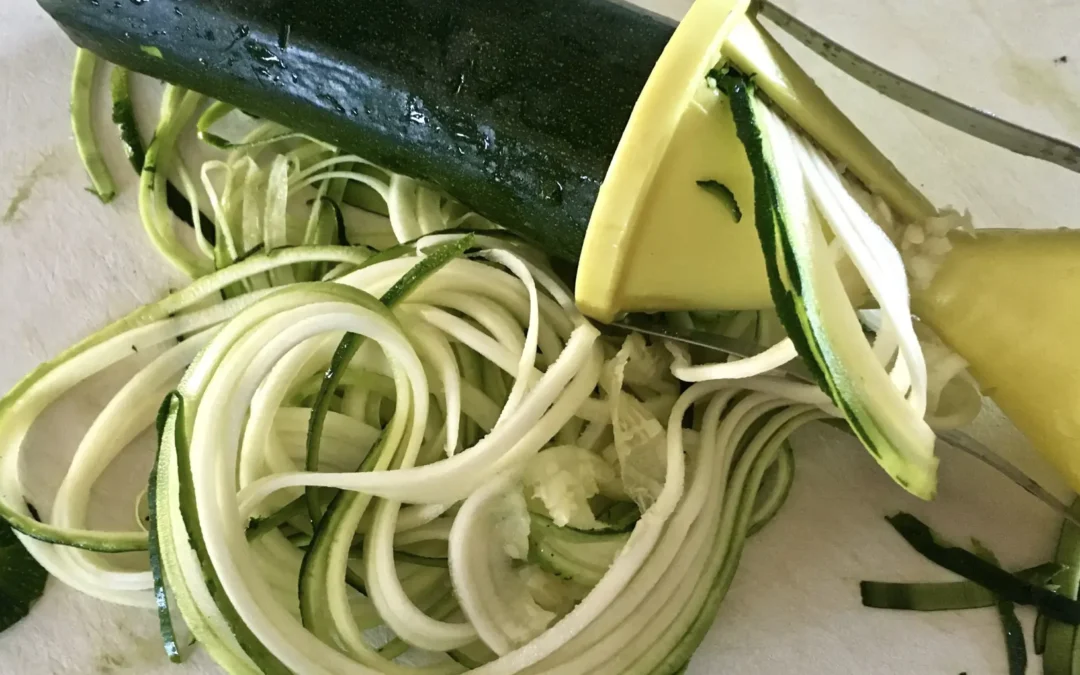 spiralizer and zucchini with shredded zucchini