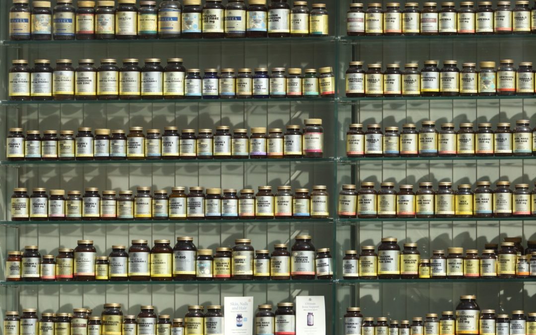 Picture of supplements all lined up on a shelf