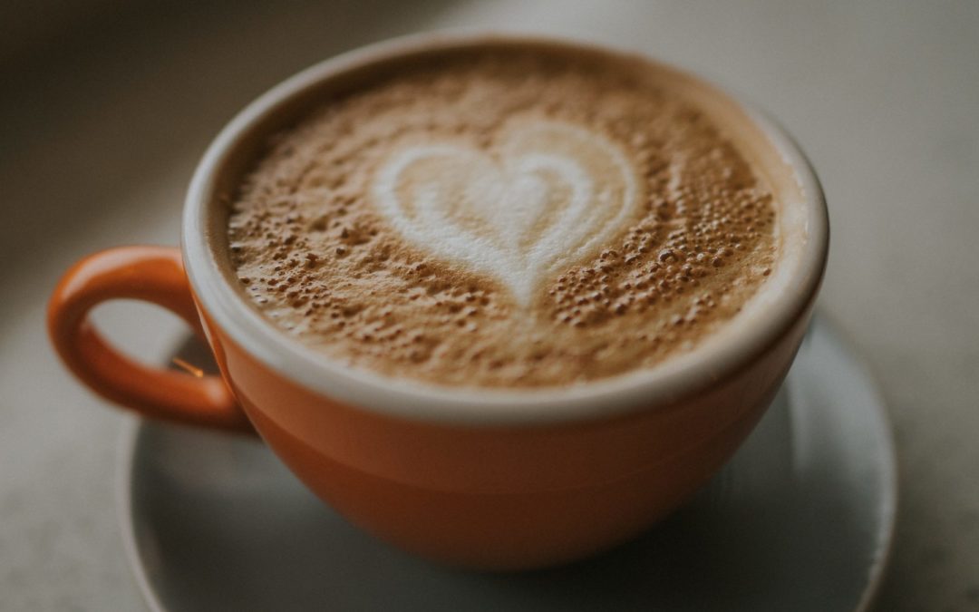 cup of coffee with heart in the foam