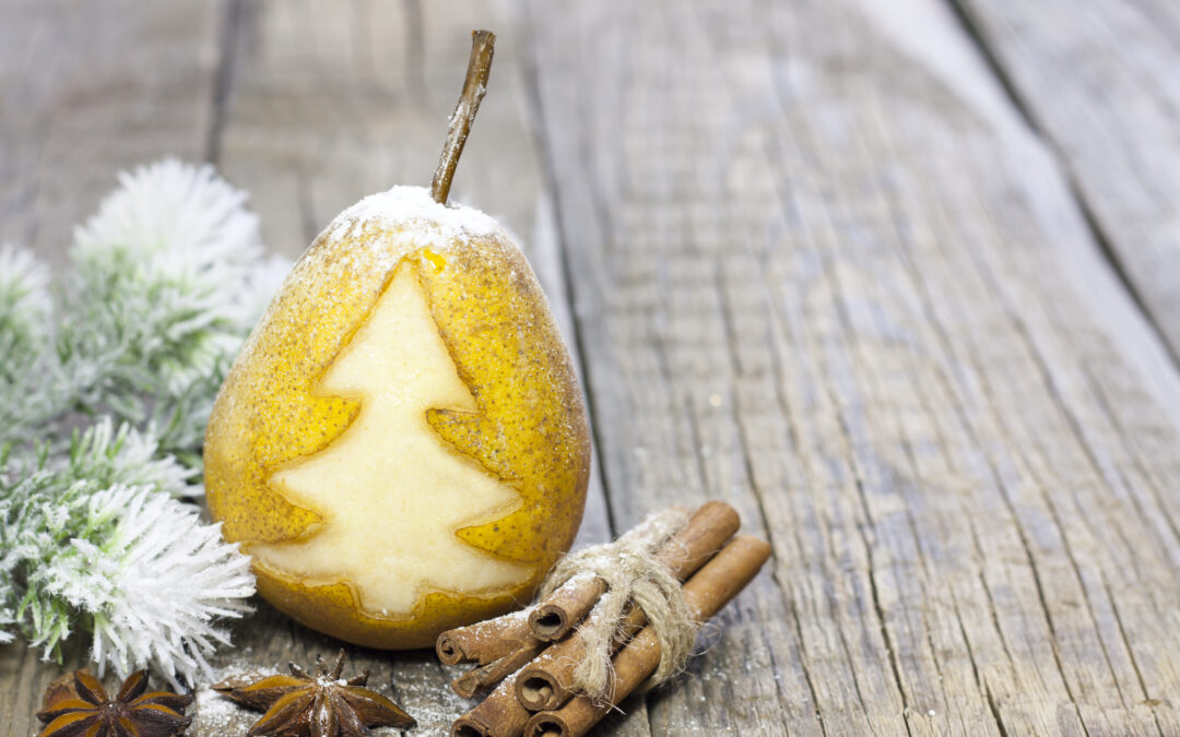 celebrate pear month. picture is pear with Christmas tree carved into it