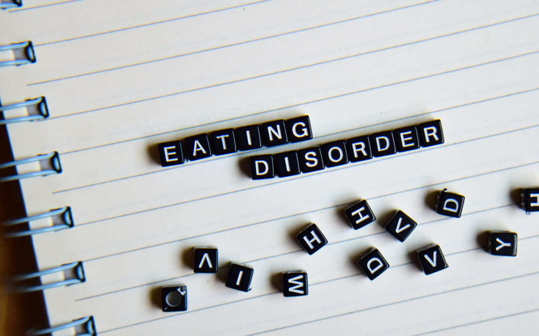 eating disorders spelled out with black beads