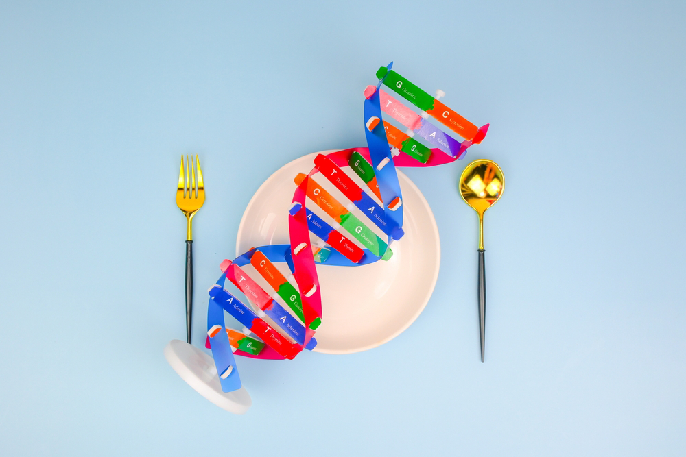 DNA strand on a plate to illustrate the important of genetic testing in nutrition