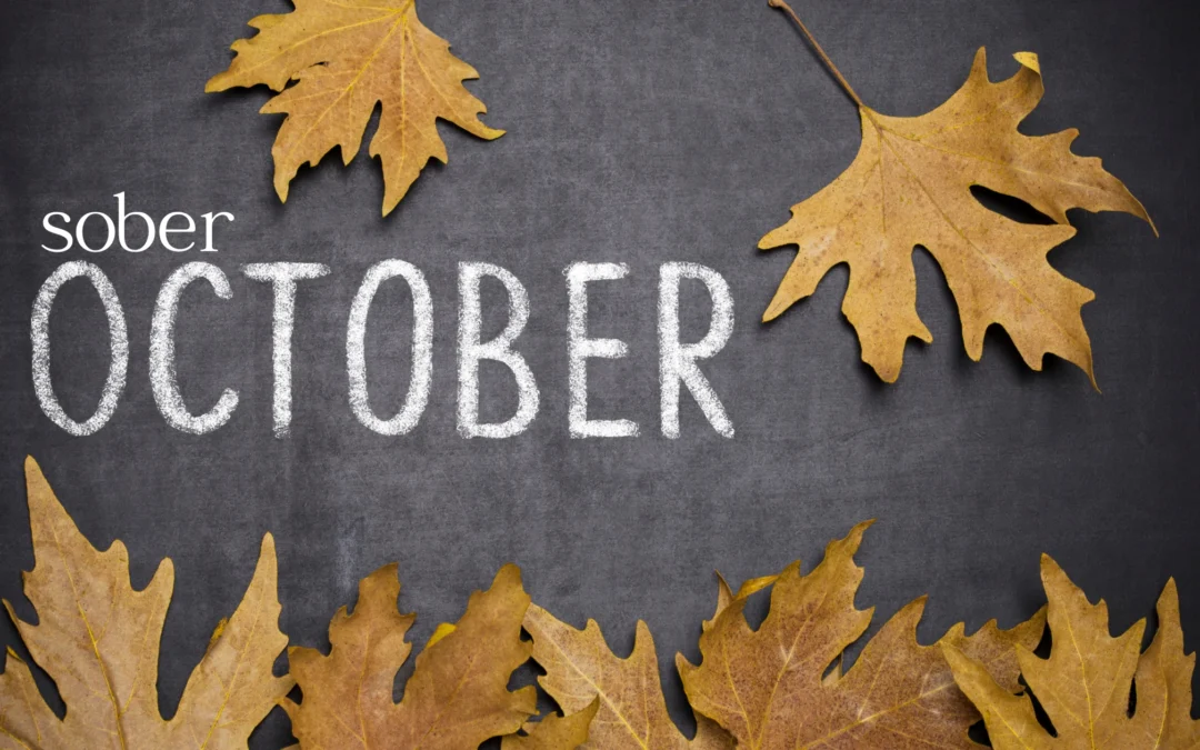 words that say "sober october" with leaves in the background