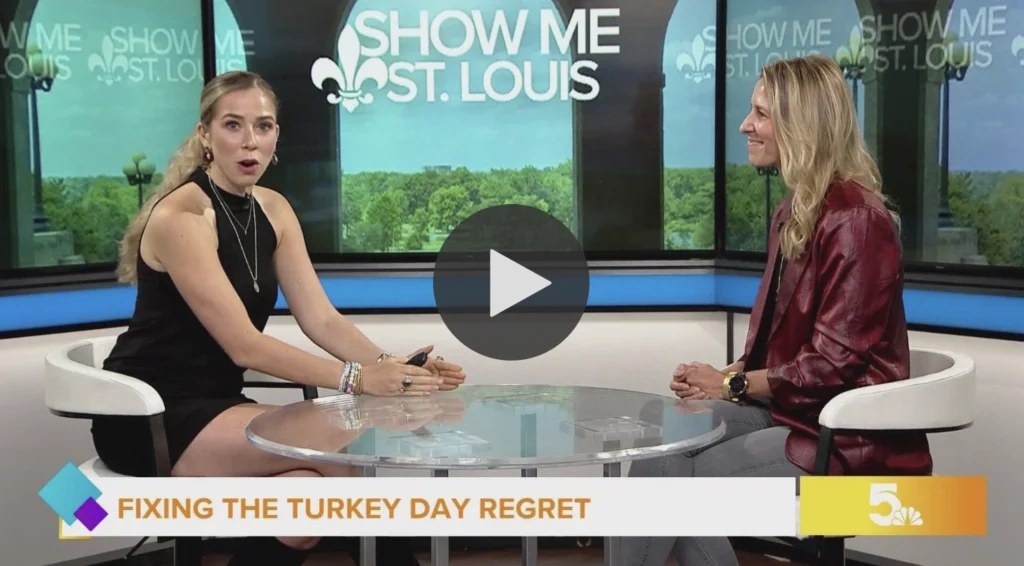 picture of two women on a tv set doing a television interview 