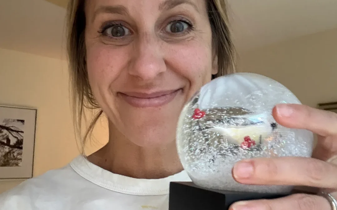 Jen holding snow globe for appy birthday McDaniel Nutrition Post