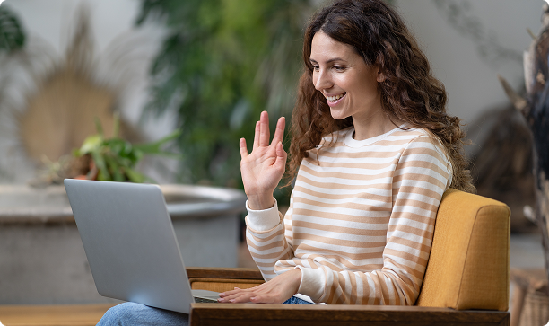 Dietitian waving to a client during a virtual nutrition counseling session